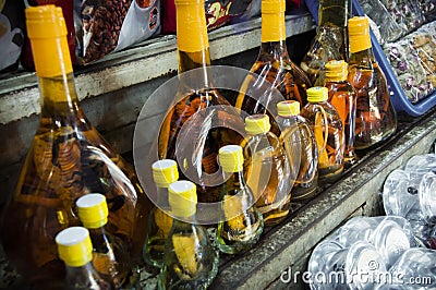 Snake Whiskey For Sale at Báº¿n ThÃ nh Market in Ho Chi Mihn City Stock Photo